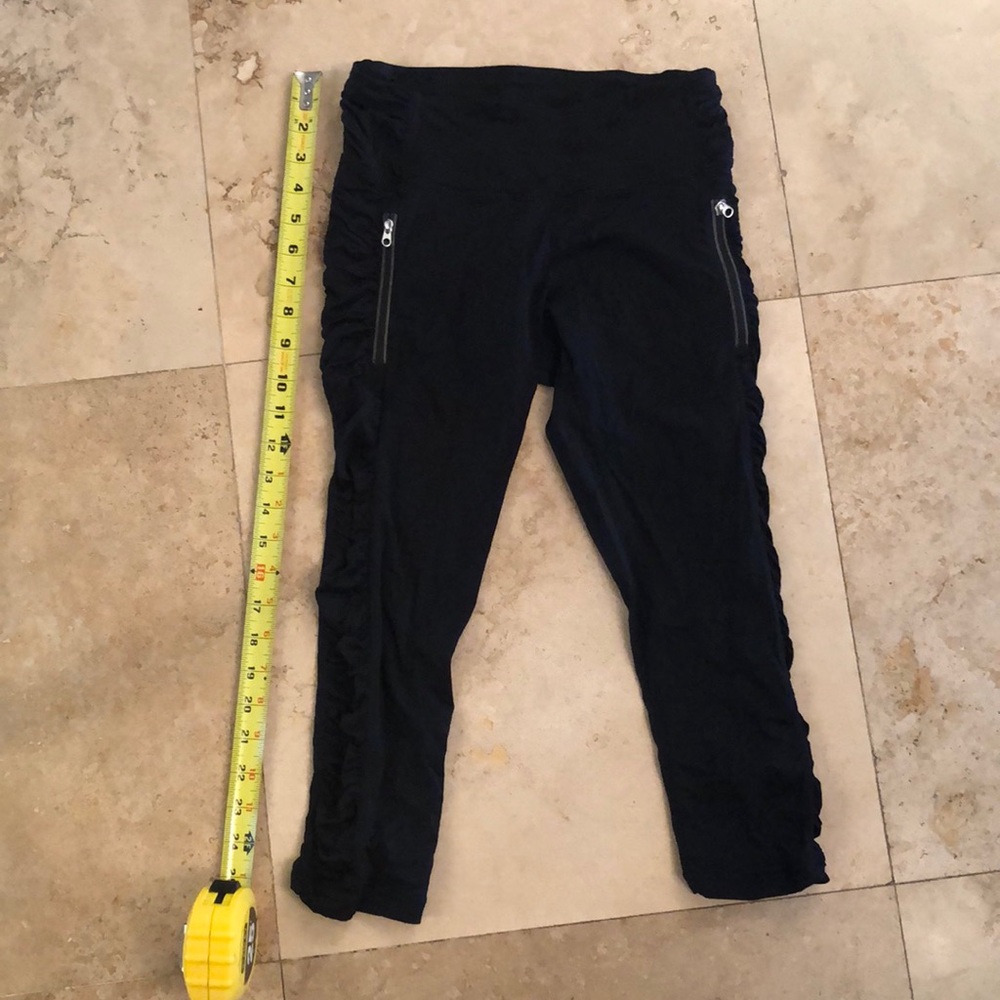 Black Lululemon crops with reflective zipper